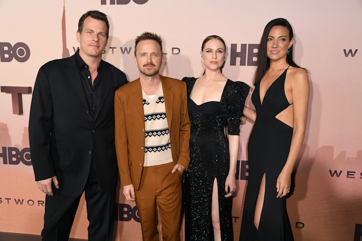 HOLLYWOOD, CALIFORNIA - MARCH 05: (L-R) Jonathan Nolan, Aaron Paul, Evan Rachel Wood, and Lisa Joy a...