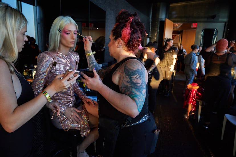 NEW YORK, NEW YORK - JUNE 25: Models prepare backstage before The Blonds and Razr fashion presentati...