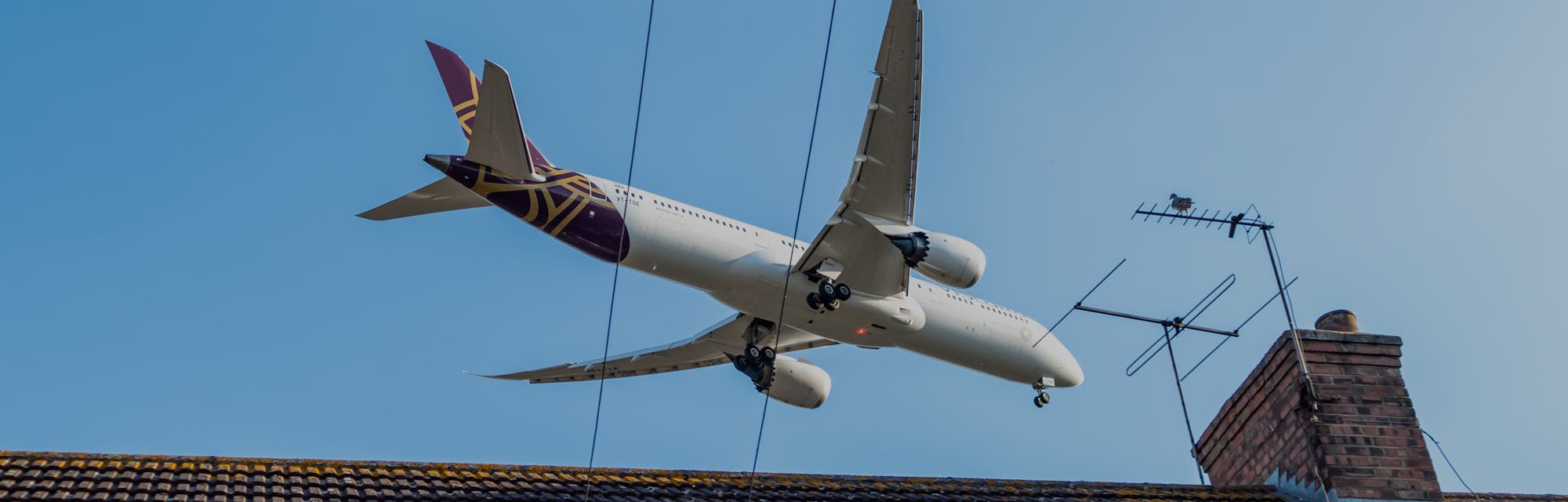 London, United Kingdom - June 15, 2022: Exterior views of Close Up Tracking Shot of commercial fligh...