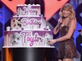 Taylor Swift with a birthday cake would need Taylor Swift lyrics for birthday party captions. 