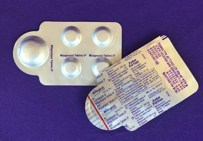 A combination pack of mifepristone (L) and misoprostol tablets, two medicines used together, also ca...