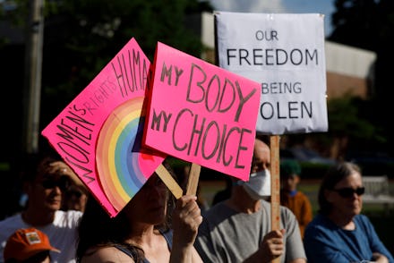 Lexington - June 24: Activists and members of the Boston Red Cloaks converge in Hastings Park in Lex...
