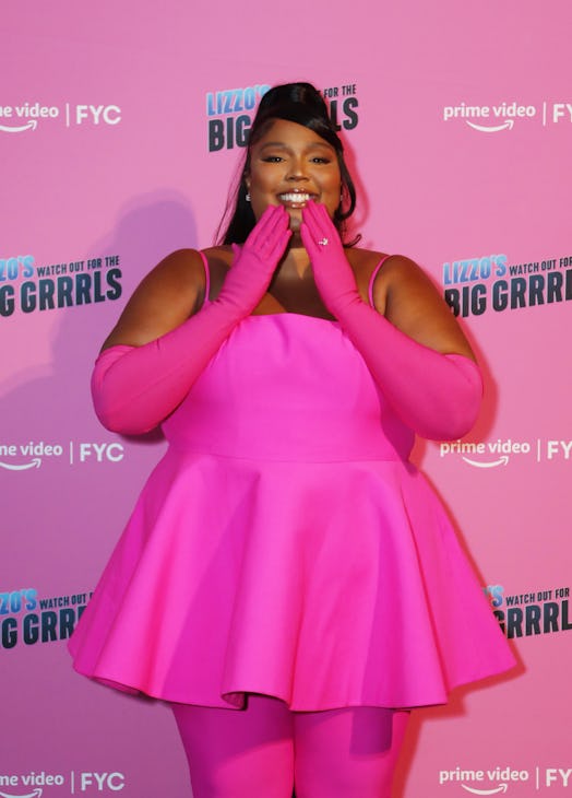 Lizzo wearing a super chic Barbiecore outfit.