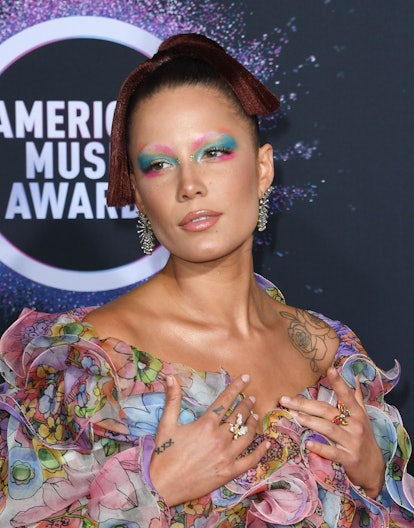 Halsey wears multicolored mermaid makeup to the 2019 American Music Awards.