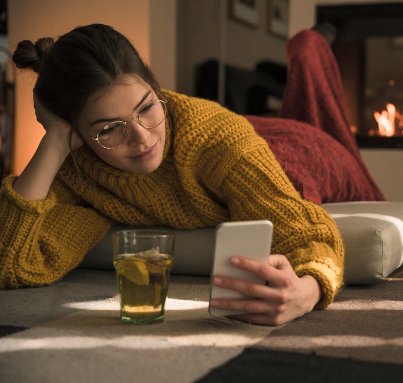 Gen Z woman sending a dirty texts to her boyfriend in the morning