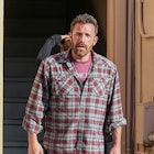 Ben Affleck in a plaid shirt and jeans.
