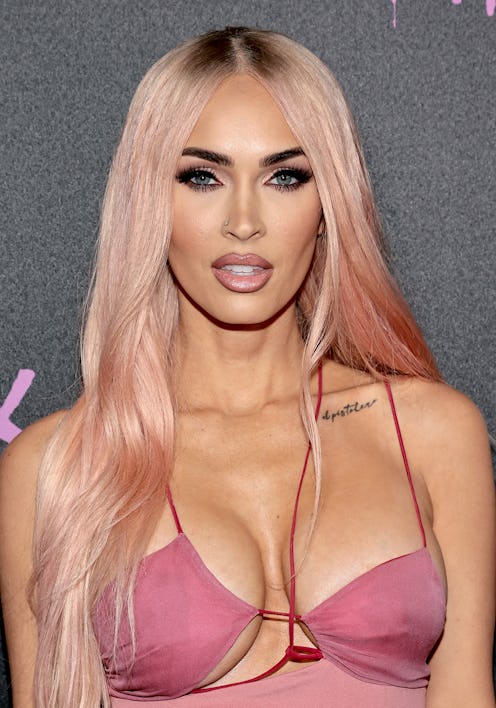 megan fox wearing a pink dress with underboob