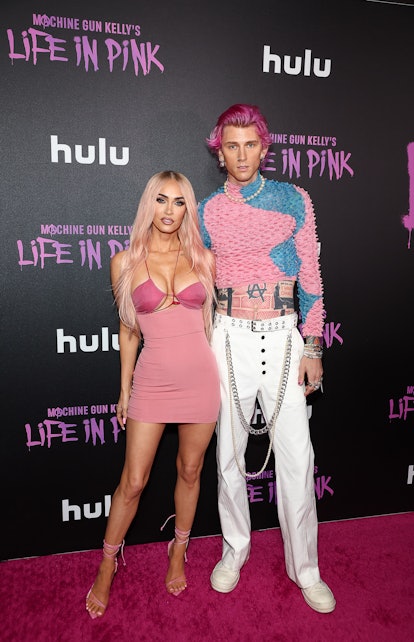 megan fox and machine gun kelly on the red carpet at the premiere of 'life in pink'