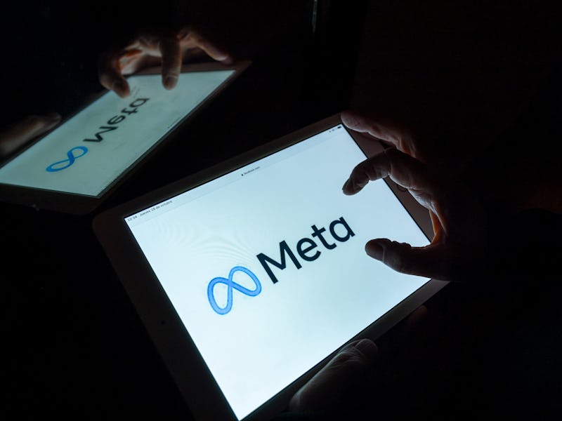 SPAIN - 2021/10/28: In this photo illustration the new Facebook Meta logo is seen on a screen of a m...
