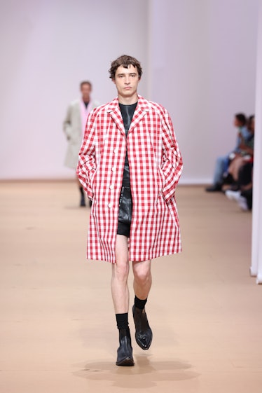 A model walks the runway at the Prada fashion show during the Milan Fashion Week