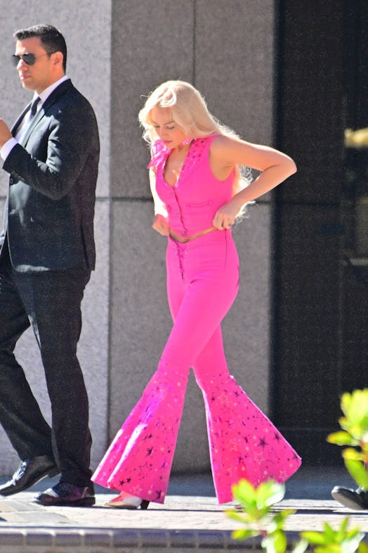 Margot Robbie is seen in costume on set of Barbie in Downtown on June 25, 2022 in Los Angeles, Calif...