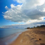 Along the southern shore of Lake Superior in northern Wisconsin huge billowing clouds roll overhead....