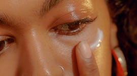 a woman has removed her makeup using awesome products under $15 to remove even the heaviest makeup