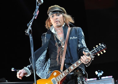 LONDON, ENGLAND - JUNE 20:  Johnny Depp of Hollywood Vampires performs live on stage at Wembley Aren...