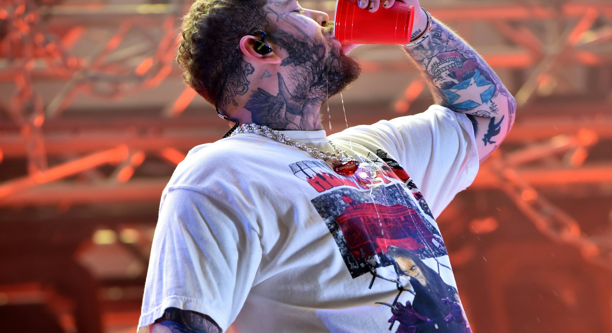 READING, ENGLAND - AUGUST 28: EDITORIAL USE ONLY Post Malone headlines the Main Stage during Day 2 o...