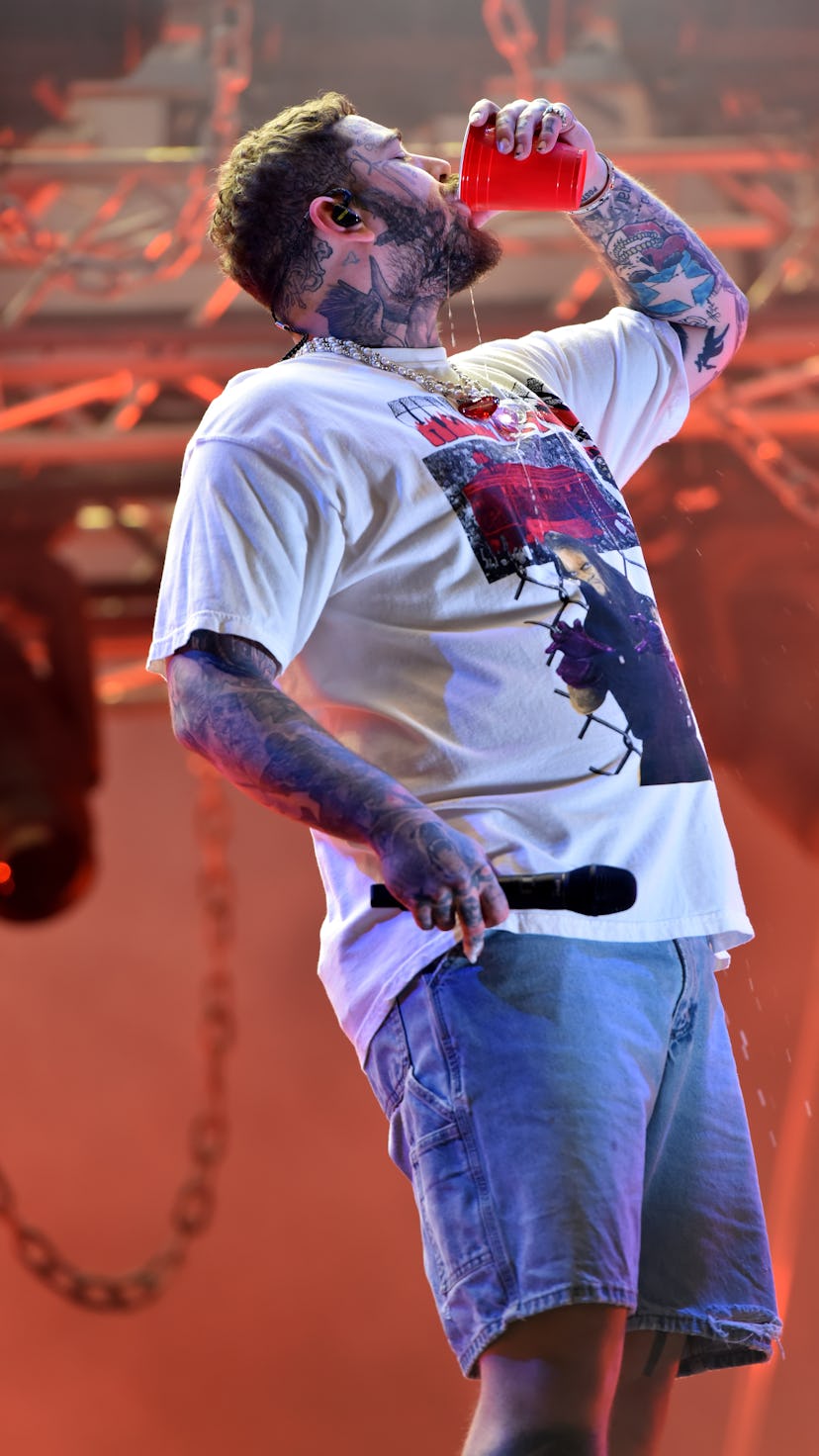 READING, ENGLAND - AUGUST 28: EDITORIAL USE ONLY Post Malone headlines the Main Stage during Day 2 o...