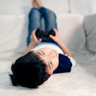 Little boy playing video games.