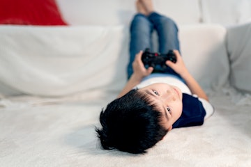 Little boy playing video games.