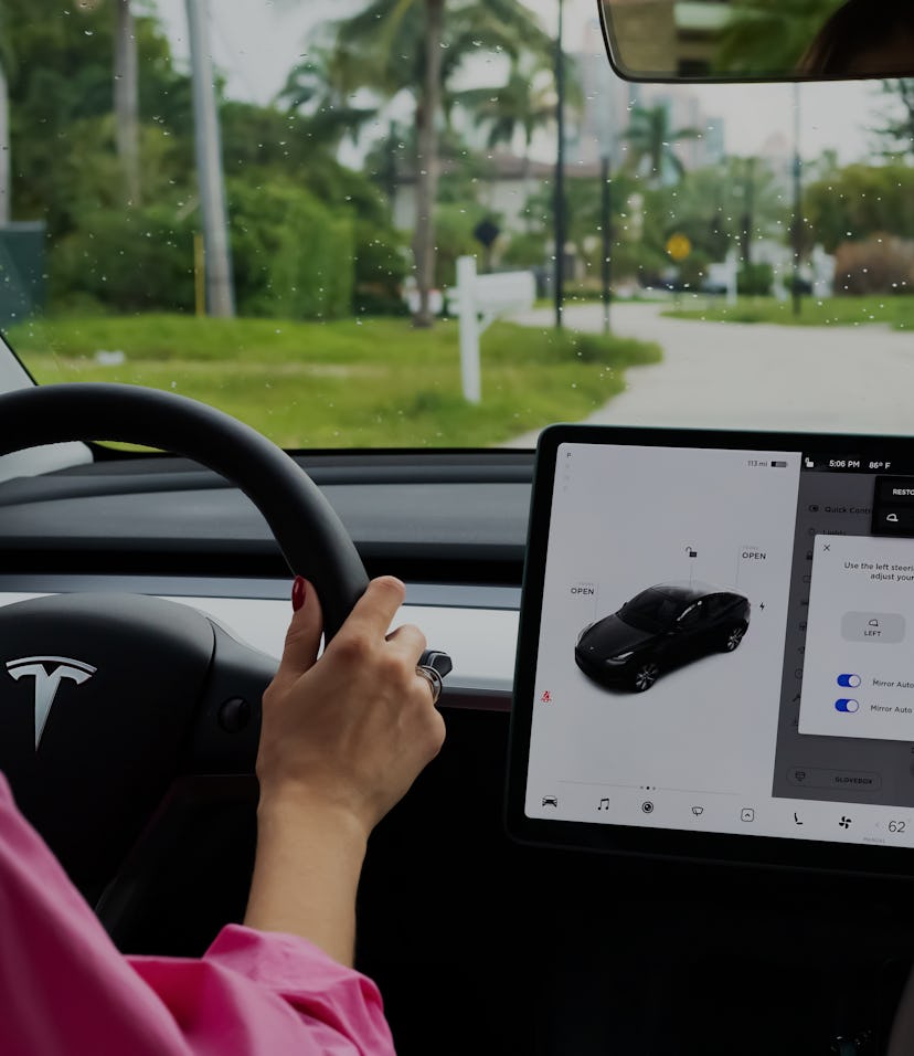 Miami, FL, United States - September 13, 2021: A cockpit with LCD touch screen of electric car Tesla...
