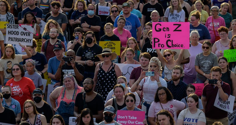 Abortion rights activists protest outside the Planned Parenthood Reproductive Health Services Center...