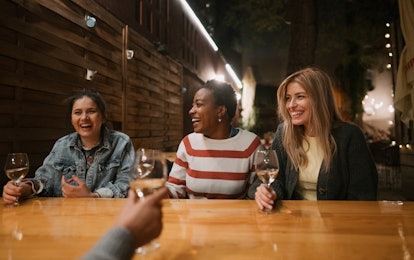 Friends drinking wine need Austin bachelorette party captions for Instagram to post their pics onlin...