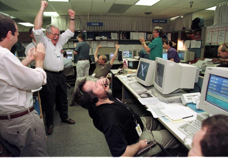 PASADENA, :  Mars Pathfinder scientists and engineers in the Mission Contol Center including Flight ...