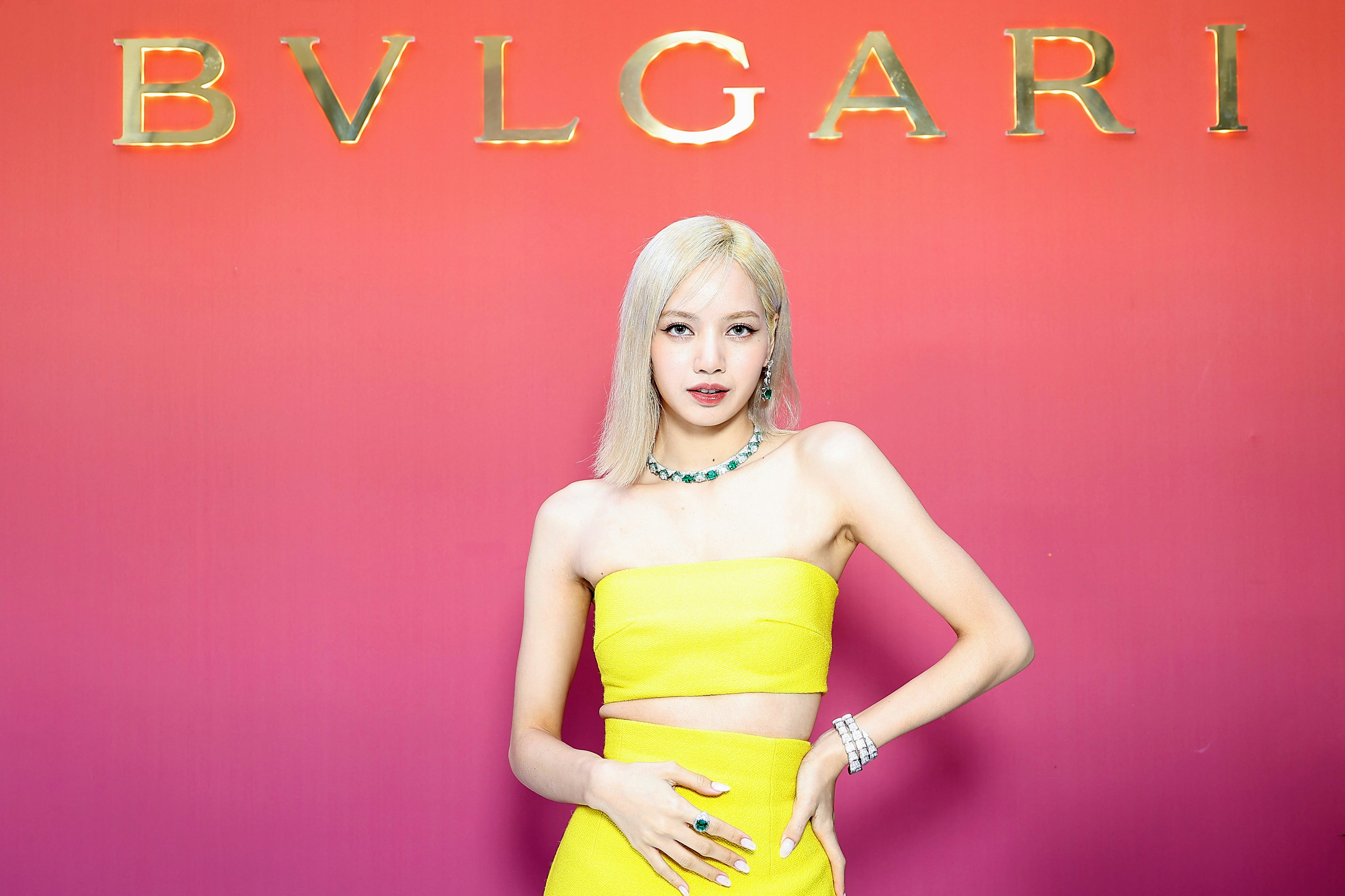 Blackpink s Lisa Wore A Yellow Matching Set For Her Latest Front