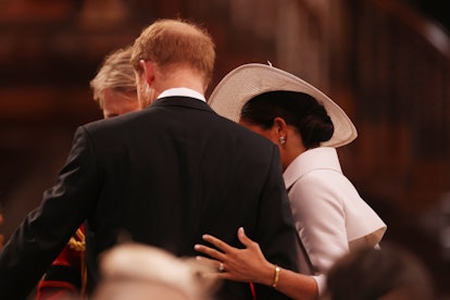 Look at Meghan Markle's hand on Prince Harry's back. Their body language at the Platinum Jubilee was...