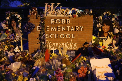UVALDE, TEXAS - JUNE 03: Flowers and photographs are seen at a memorial dedicated to the victims of...