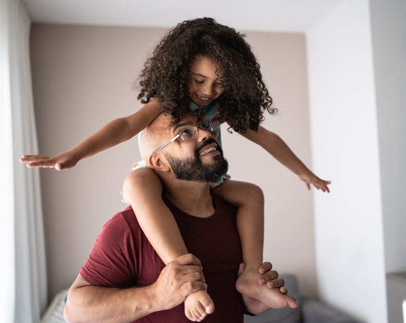 Father carrying daughter on shoulders, father's day gift baskets