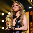 Jennifer Lopez teared up as she accepted the MTV Generation Award onstage during the 2022 MTV Movie ...