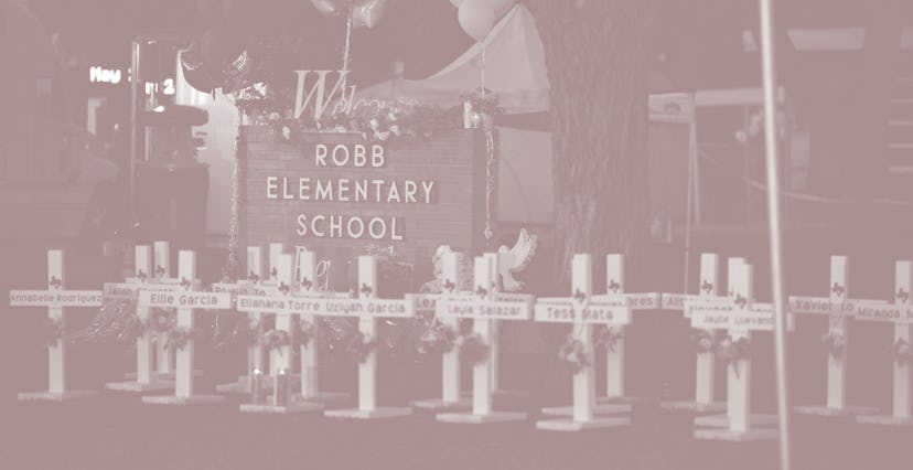 Uvalde, TX - May 26: White crosses marking the deaths are pictured in front of Robb Elementary Schoo...