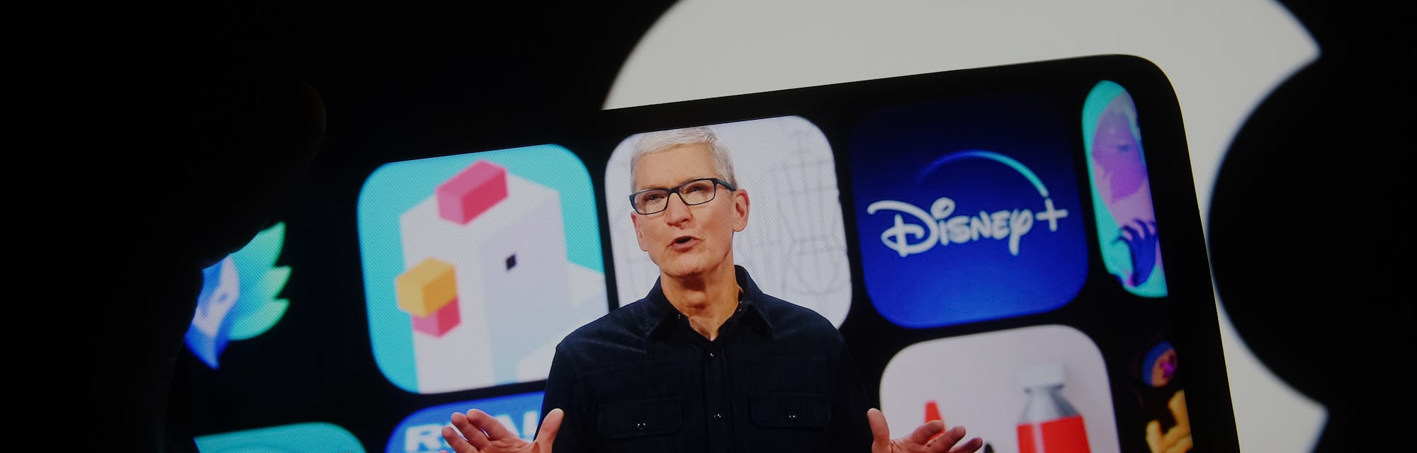 UKRAINE - 2021/06/07: In this photo illustration the Apple CEO Tim Cook is seen on a mobile phone sc...