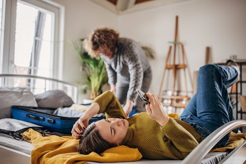 Two people, young couple packing suitcases together in bedroom. Here are the least compatible life p...