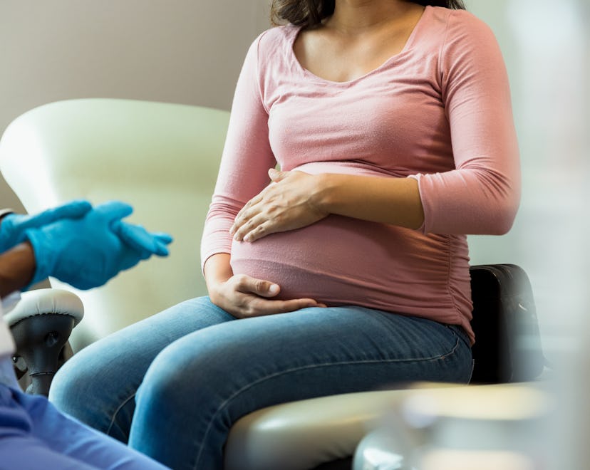 pregnant woman at exam, signs your cervix is opening