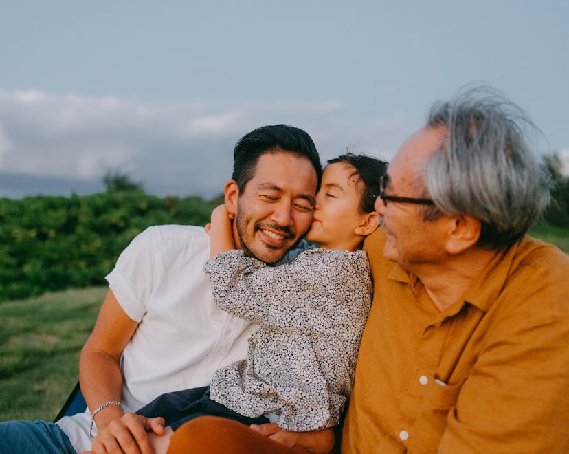 Three generation family having a good time at dusk, best father's day gifts for sons
