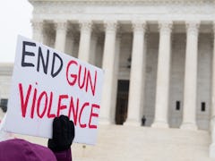 Supporters of gun control and firearm safety measures hold a protest rally outside the US Supreme Co...