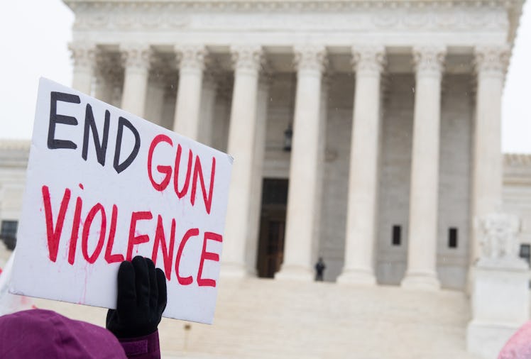 Supporters of gun control and firearm safety measures hold a protest rally outside the US Supreme Co...