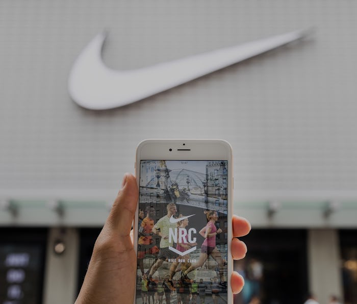 Hong Kong, Hong Kong - AUGUST 23: A smart phone with the Nike+ Run Club app is seen on the screen on...
