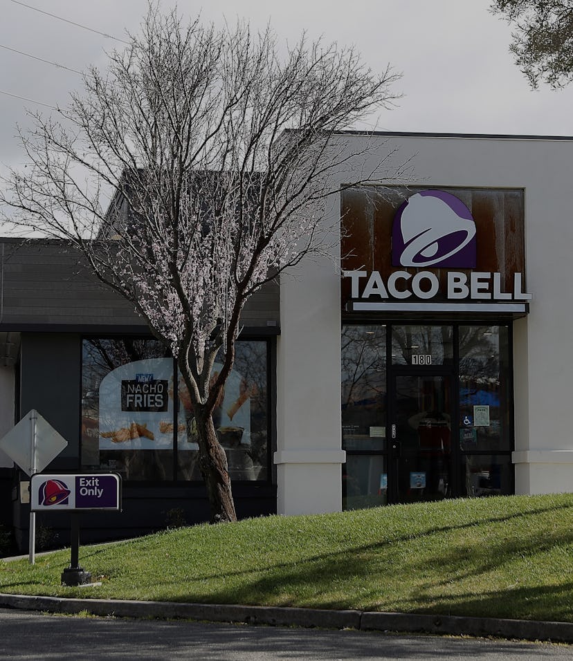 NOVATO, CA - FEBRUARY 22: A car goes through a drive thru at a Taco Bell restaurant on February 22,...