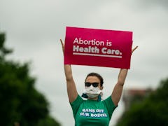 WASHINGTON, DC - MAY 14:  Abortion rights activists participate in a Bans Off Our Bodies rally and m...