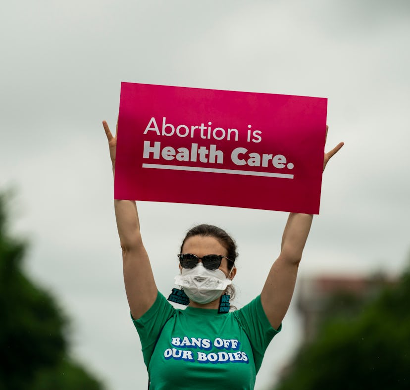 WASHINGTON, DC - MAY 14: Abortion rights activists participate in a Bans Off Our Bodies rally and m...