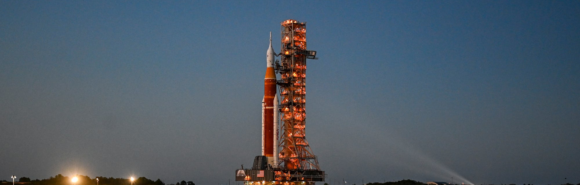 MERRITT ISLAND, FL - MARCH 17: The Artemis I Moon-bound rocket rolls out of the Vehicle Assembly Bu...