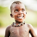 A curious young African child of the Hadzabe tribe (Africa's last hunter/gatherer tribe) in Tanzania...