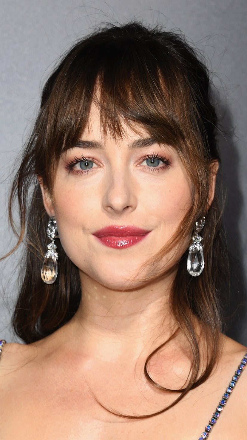 Dakota Johnson long hair with bangs