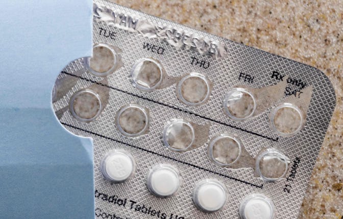 Birth control pills rest on a counter in Centreville, Maryland, on July 6, 2022. - The US Supreme Co...
