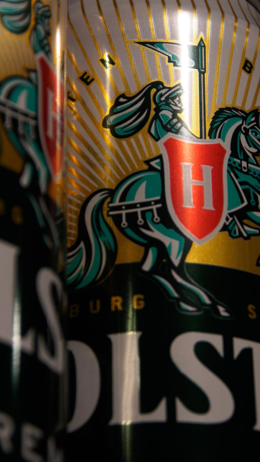 MOSCOW, RUSSIA - 2022/03/31: Holsten logo seen on beer cans. It was reported that Carlsberg Group is...