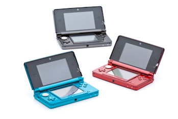 "Caracas, Venezuela - July 16, 2012: Studio shot three Nintendo 3DS video game consoles. Nintendo Co...