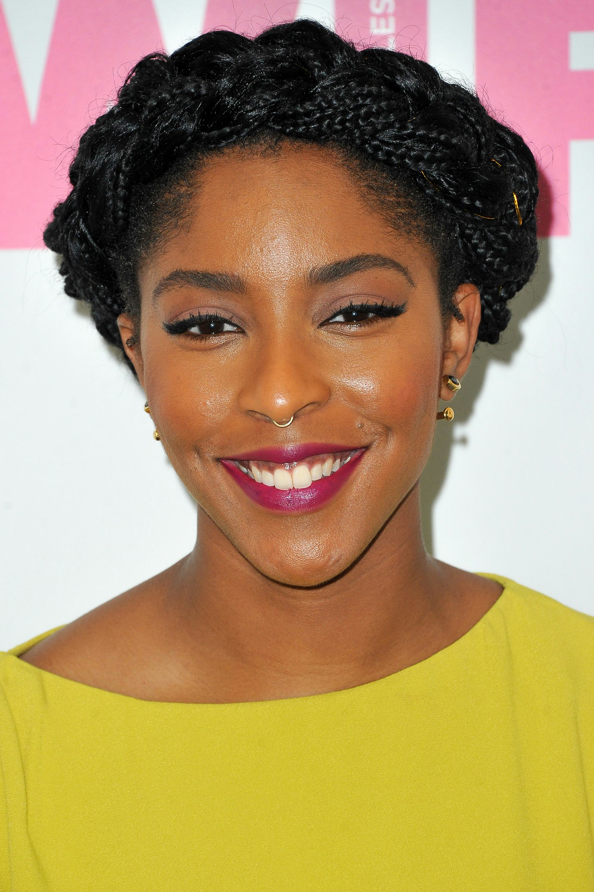 Jessica Williams wears braided French braids wrapped around the top of her head at the Women In Film&hellip;