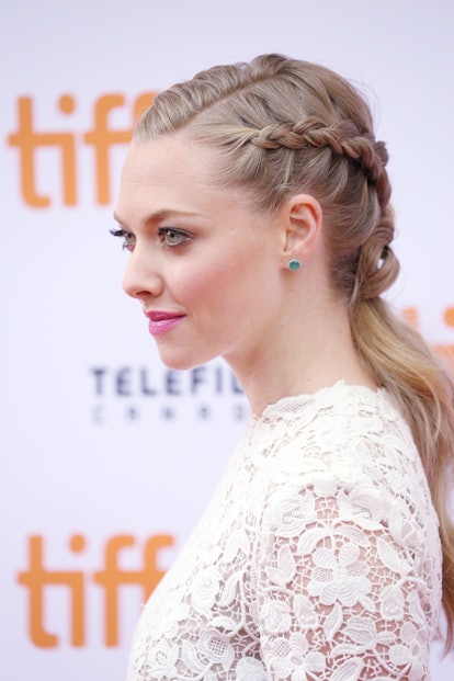 Amanda Seyfried wearing side French braids on the 'While We're Young' red carpet. 